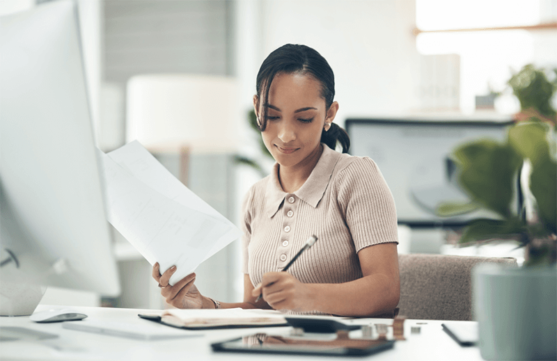 Woman writing notes