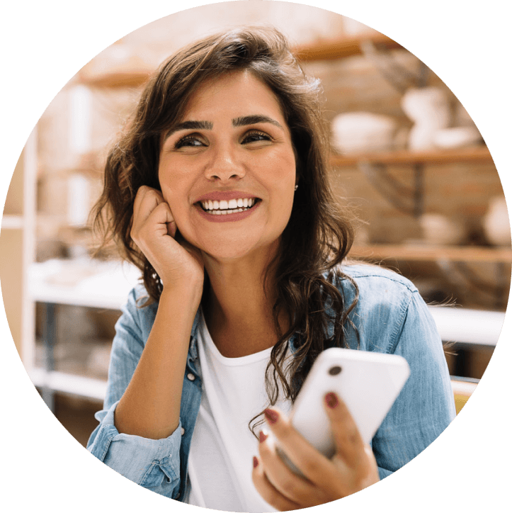 woman looking at a cell phone