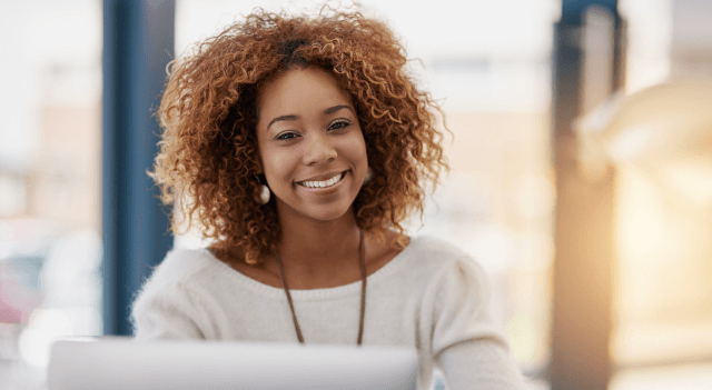 Woman looking at a laptop